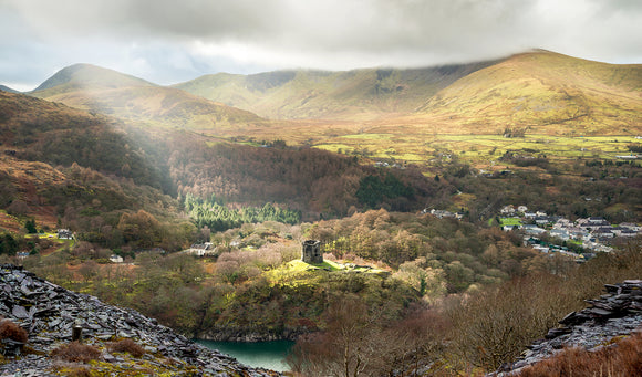 Spotlight on Dolbadarn Castle. A single ray of light illuminates the Castle at Llanberis, North Wales. Landscape photography in Snowdonia by Chris Smart of Smart Imaging